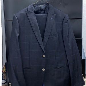 Indochino charcoal suit blue stripes